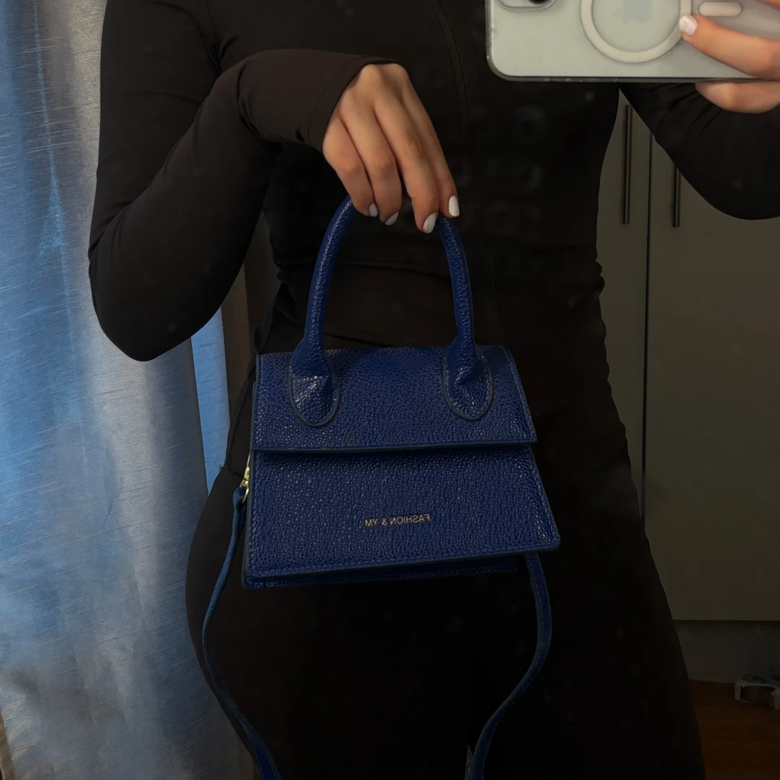 Blå handväska 