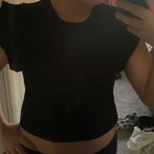 Svart blus från Zara från Zara - Stretacig svart blus