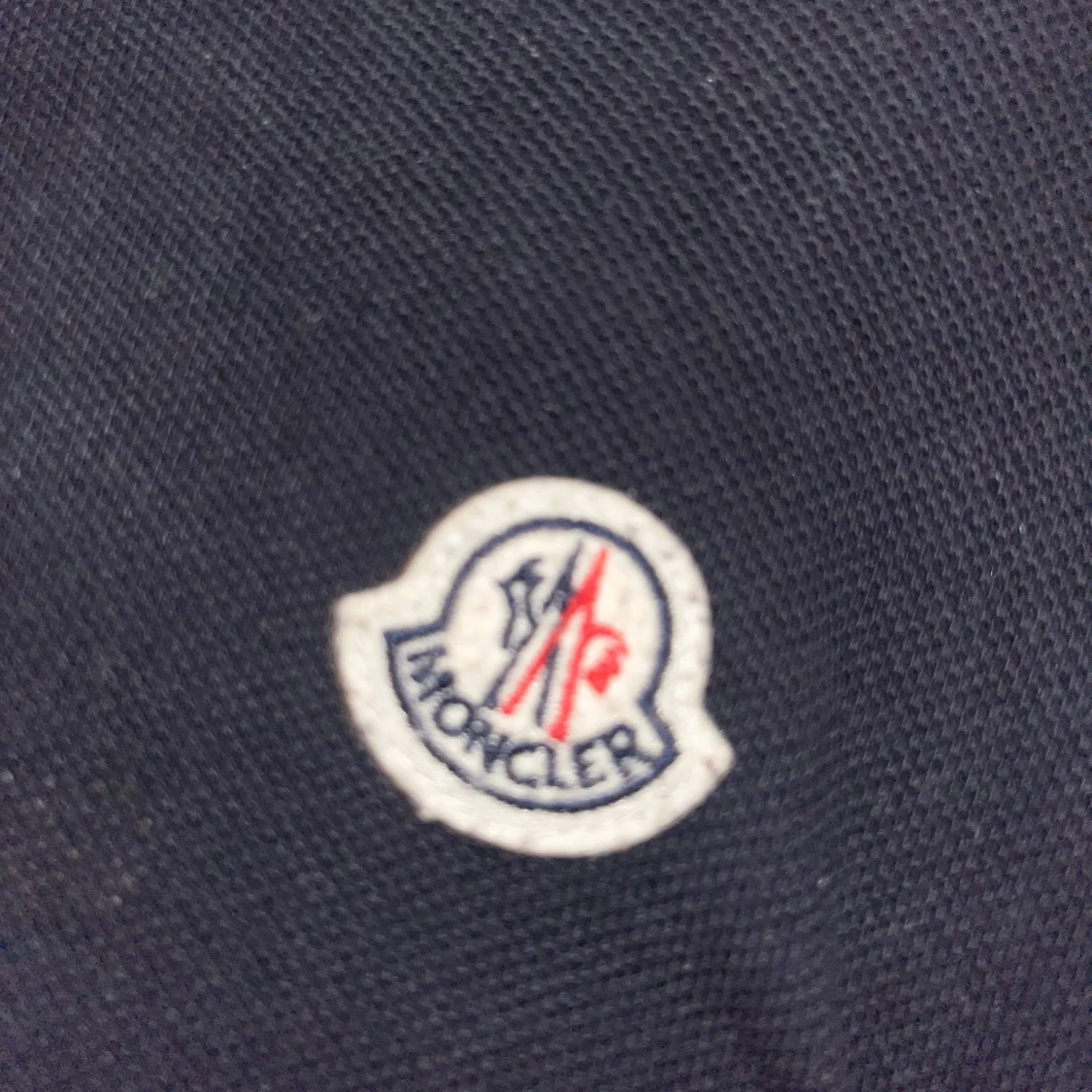 Svart pikétröja från Moncler - 2