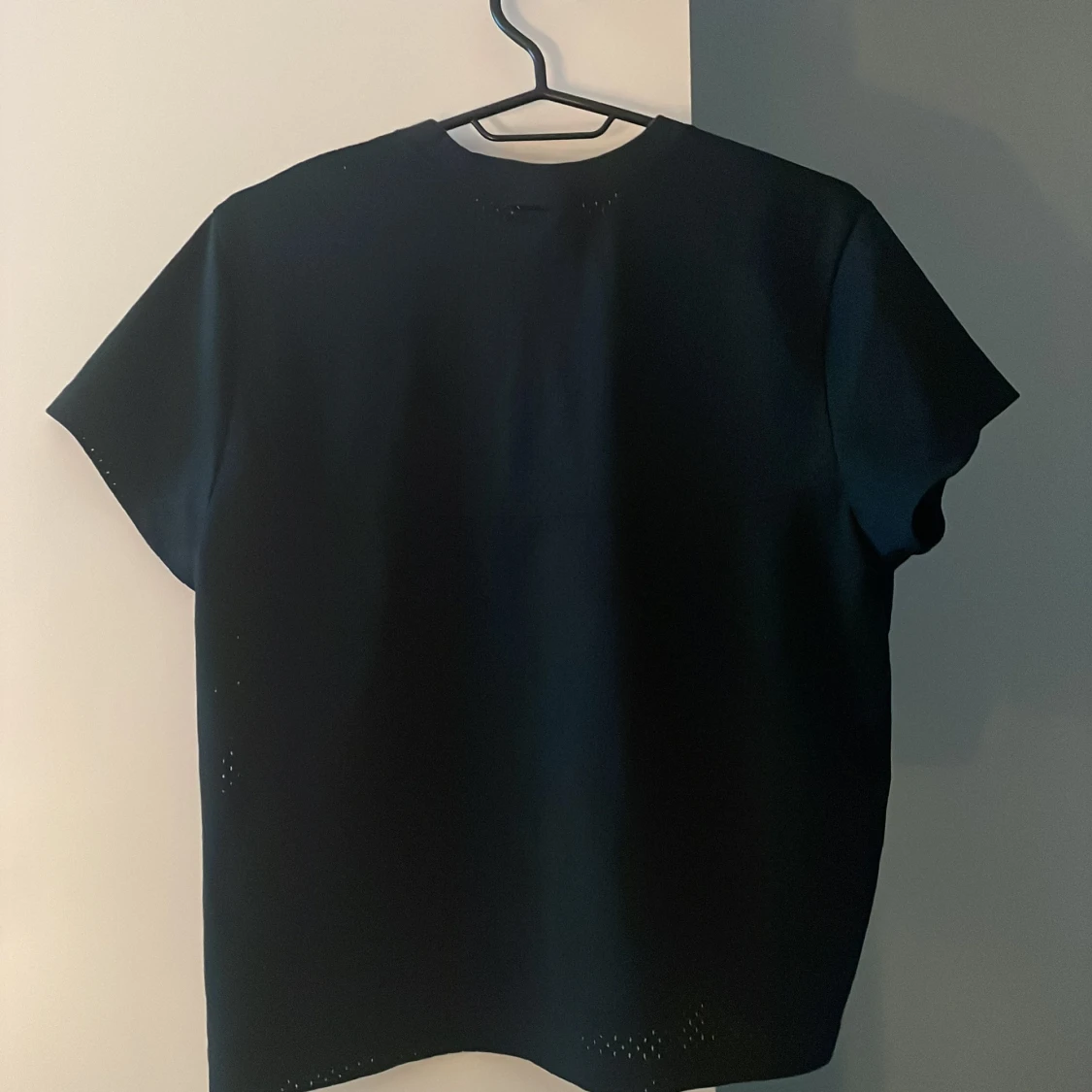 Svart Nike t-shirt med meshdetaljer - 1