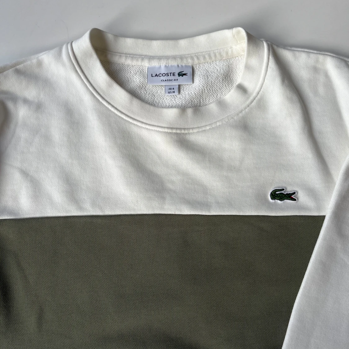 Vit sweatshirt från Lacoste med logga - 1