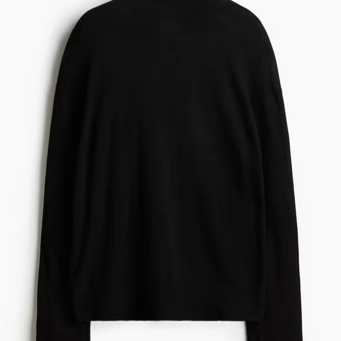 Svart polotröja i stickat material - 2