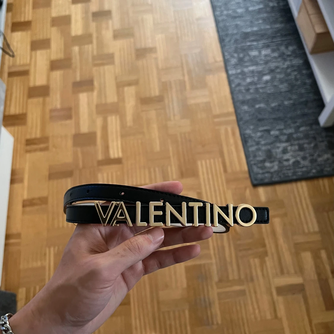 Svart bälte från Mario Valentino