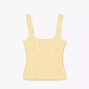 Gul zara topp med rosetter  - Säljer den gula zara toppen, helt ny med prislapp kvar då den va förtår på mig. 