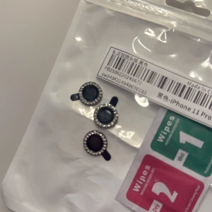 Accessoar telefon - Glitter till kameran på telefonen iPhone 11 Pro