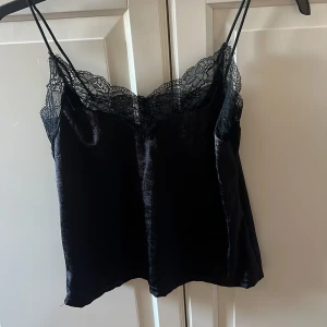 Svart linne  - Svart linne från okänt i storlek xs 