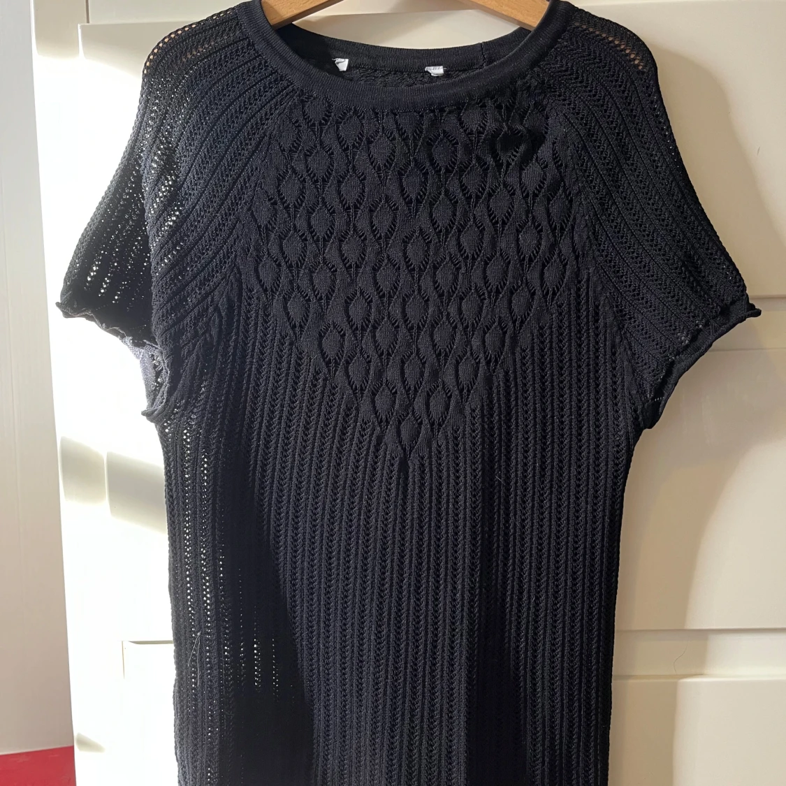 Svart stickad kortärmad topp