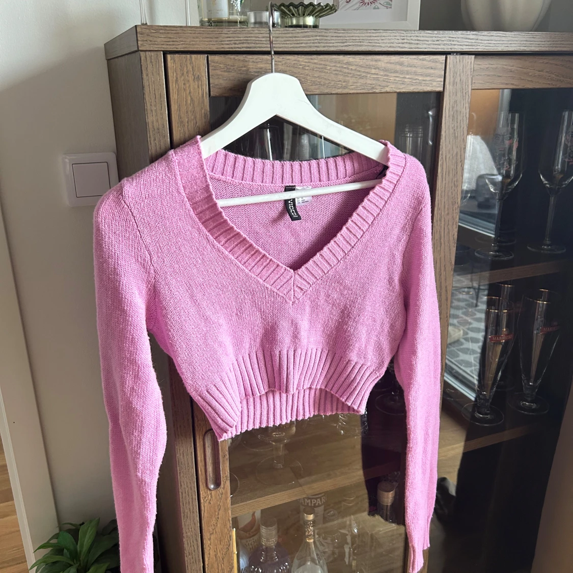Rosa croppad stickad tröja från H&M