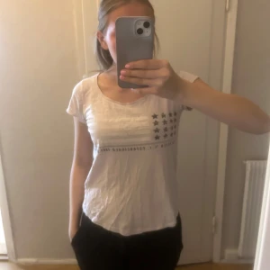 Vintage T-shirt  - Ljusrosa t-shirt från Gina tricot. 