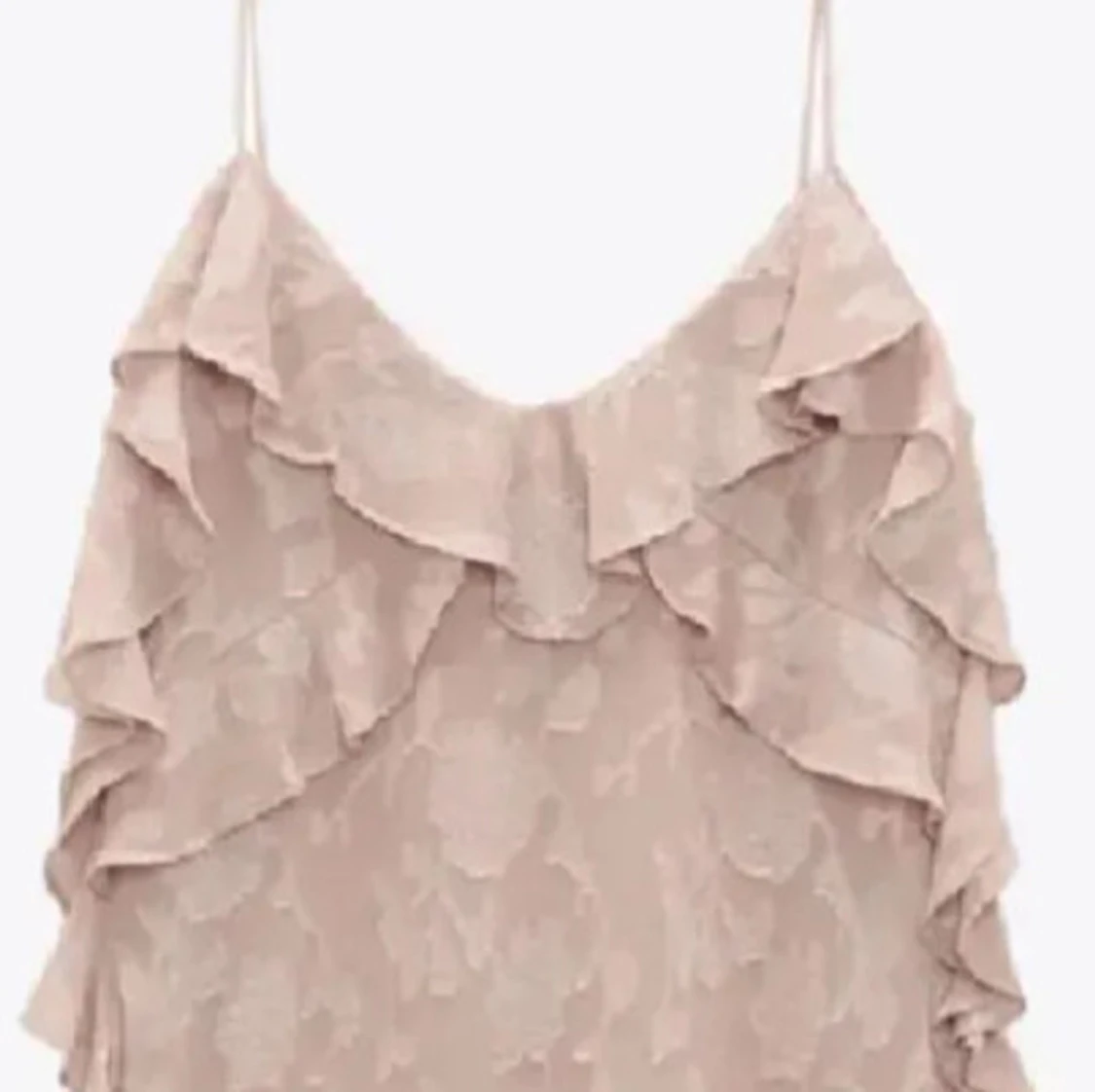 Rosa volanglinne med tunna axelband