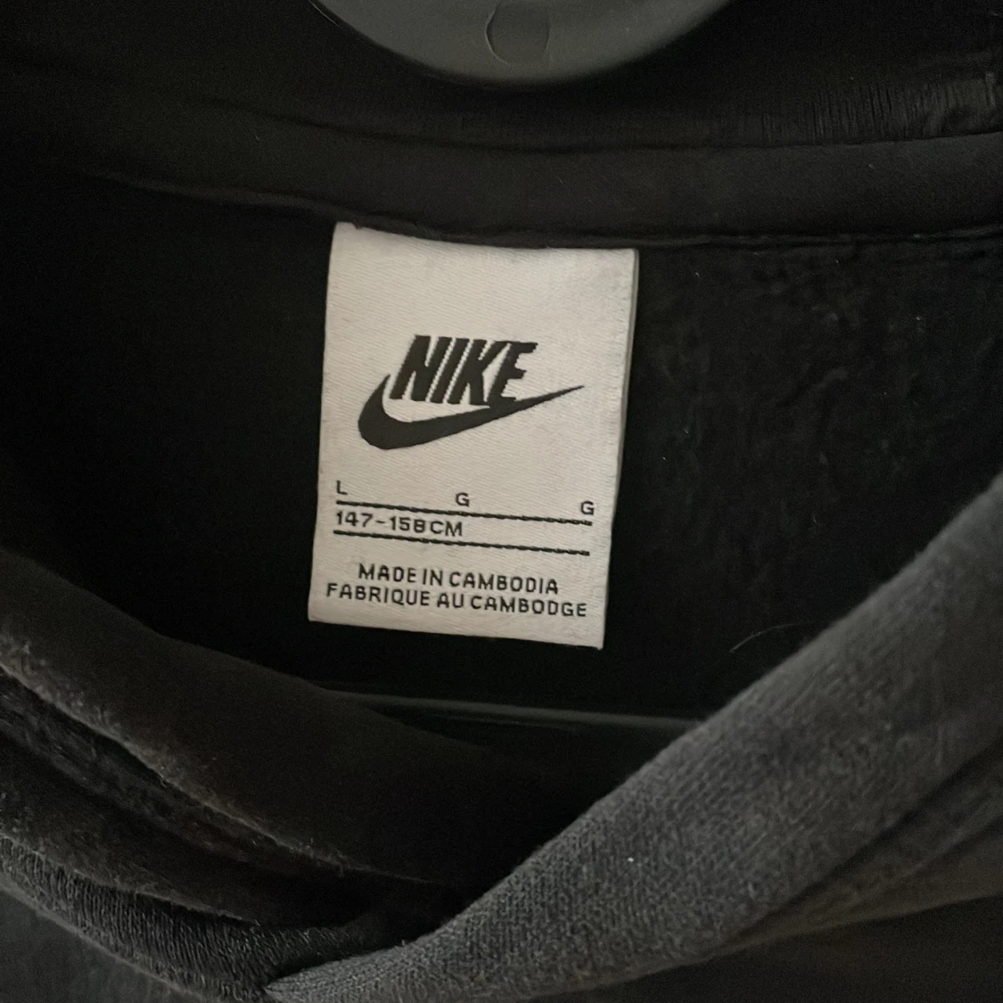 Svart hoodie från Nike med logga - 1