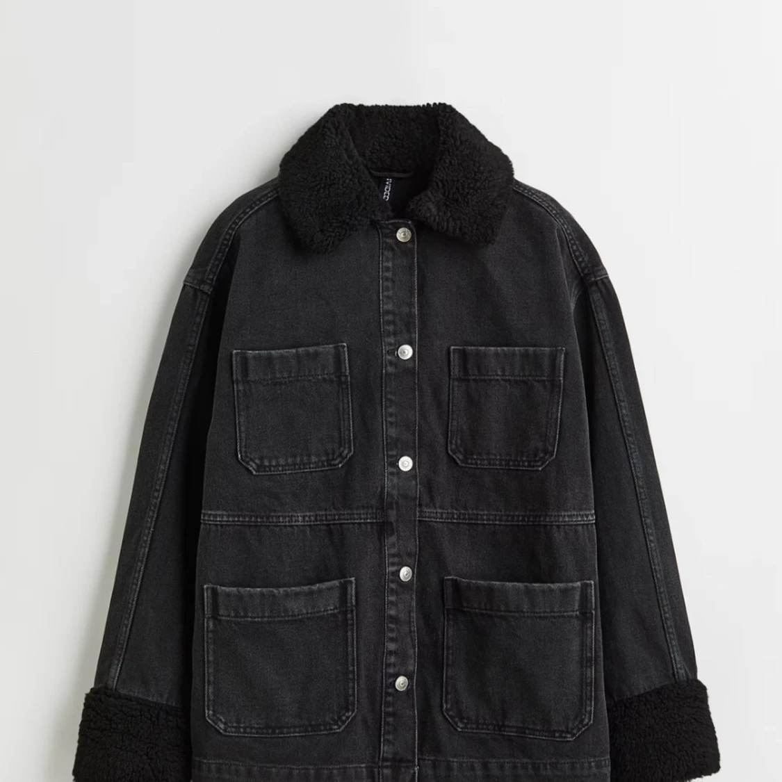 Svart jeansjacka med teddykrage