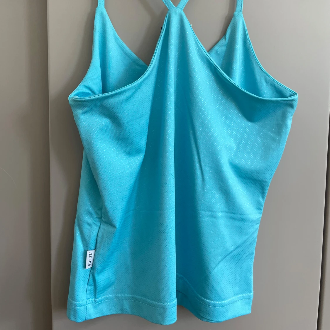 Turkos glittrig linnetopp från Guess - 2