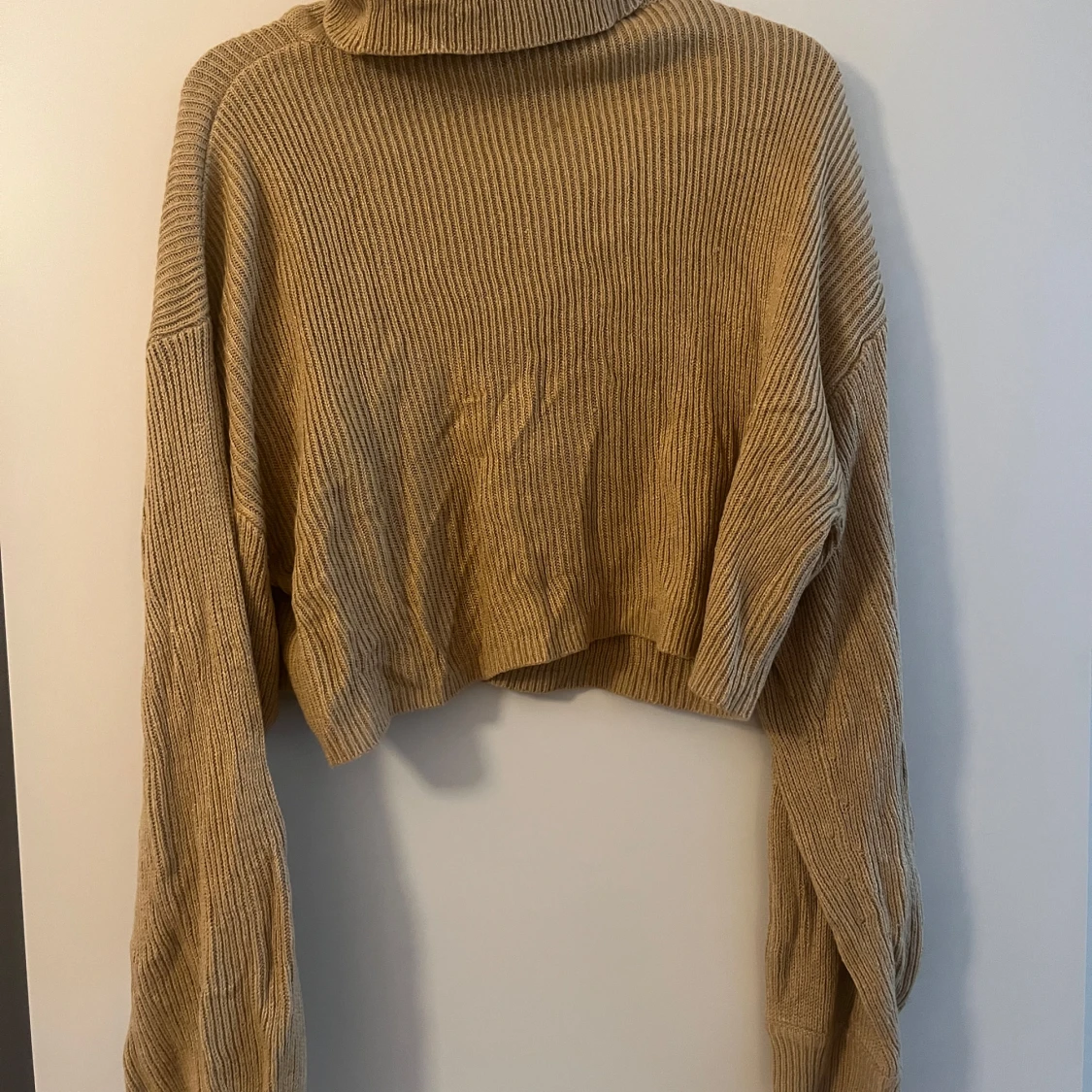 stickad croppad långärmad stl M - 1