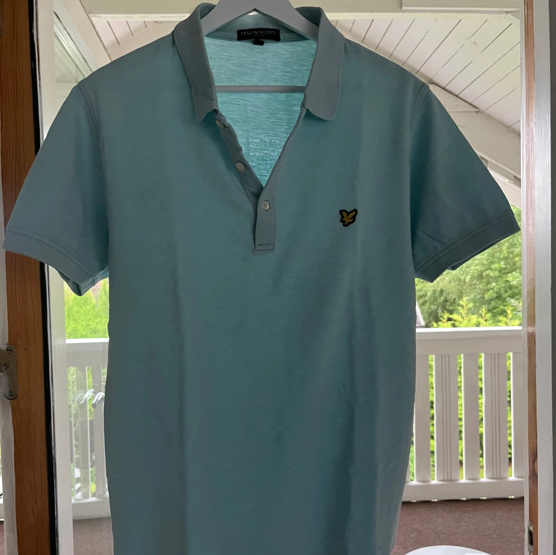 Ljusblå piké från Lyle & Scott