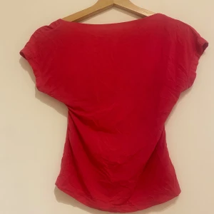 Rosa topp med öppen rygg - Super fin topp med öppen rygg! 