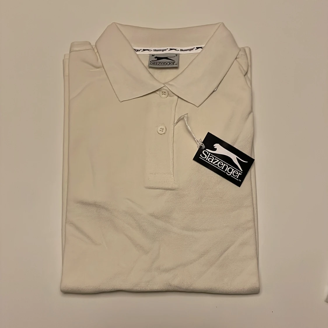 Vit pikétröja från Slazenger