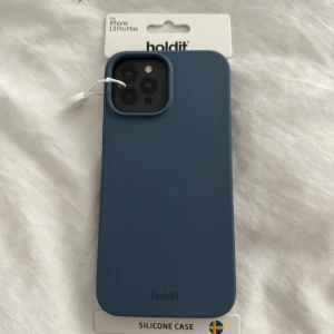 holdit skal - mörkblå fortfarande i förpackningen, säljer pga råkade köpa för fel modell. denna är för iphone 13 pro max. 