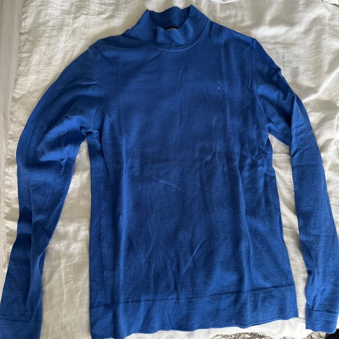 J.Lindeberg Blå merinoull polotröja. storlek S herr - 2