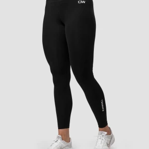Svarta leggings från ICANIWILL - Svarta tights från ICANIWILL med hög midja och tight passform. Snyggt diskret logga framtill och längs benet. Perfekta för träning med stretchigt och mjukt material som sitter skönt hela dagen🖤