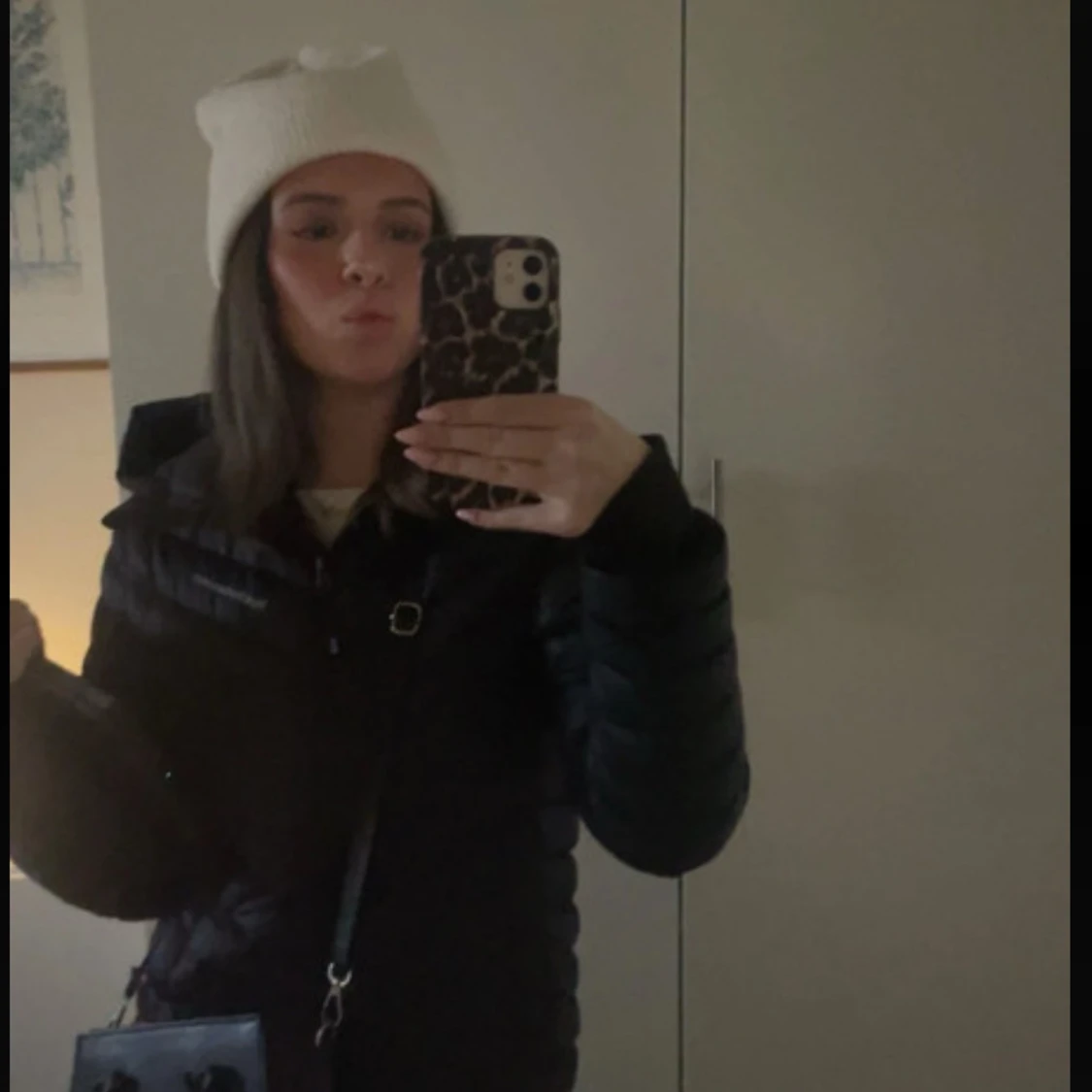 Svart dunjacka från Peak Performance