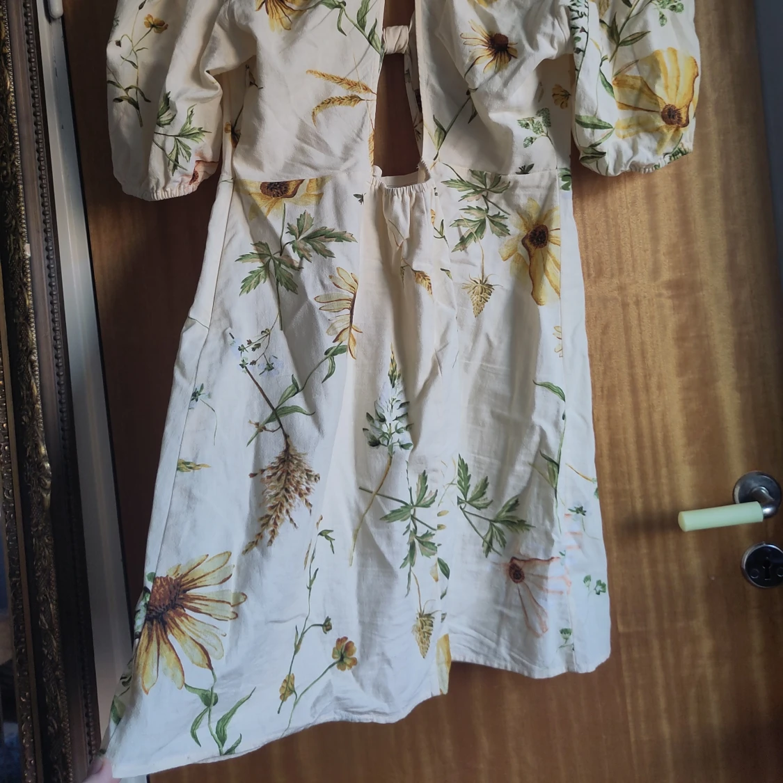 Blommig klänning från H&M - 2