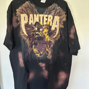 Pantera T-shirt XL med meleringar - Helt ny T-shirt med meleringar på . Storlek XL.