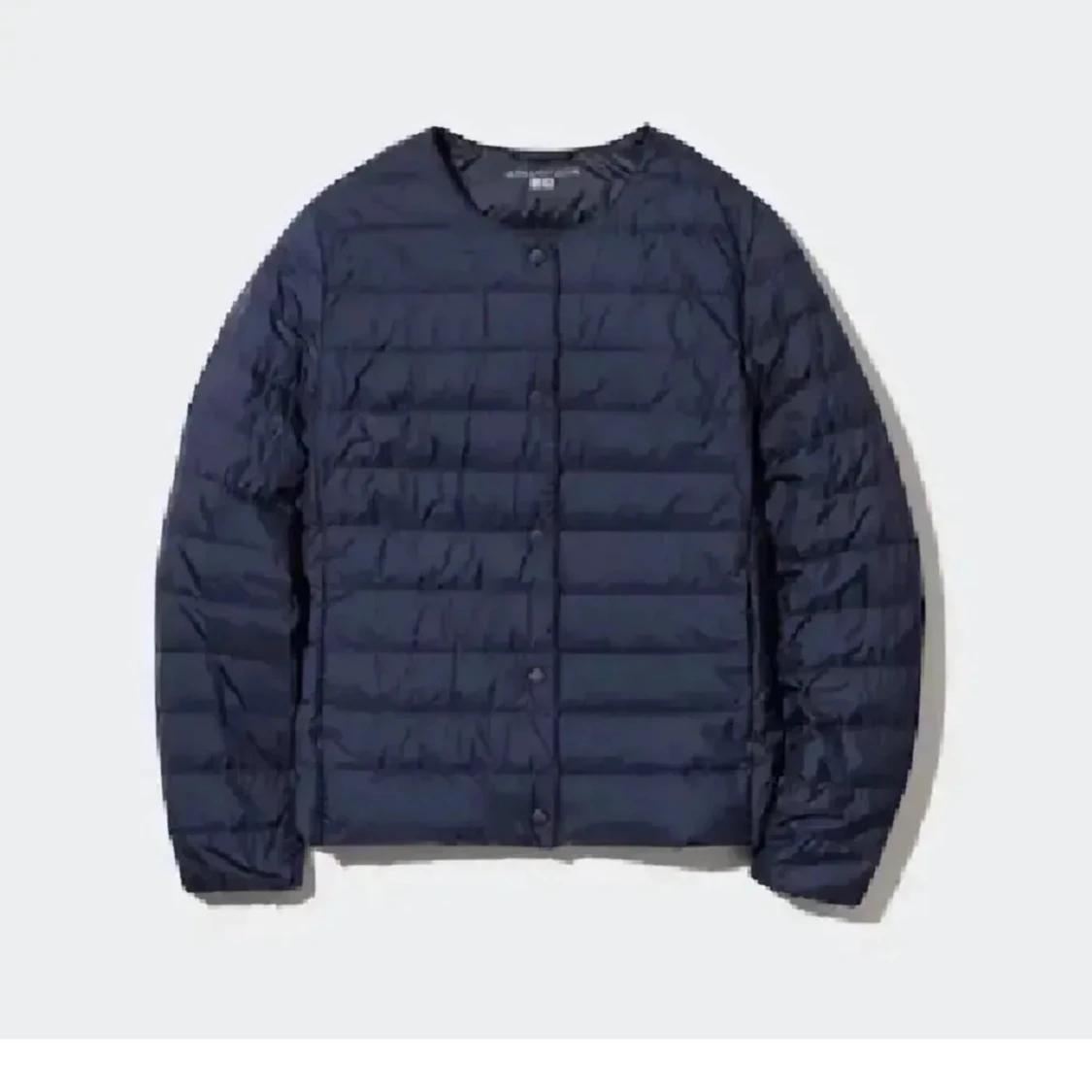 Mörkblå uniqlo jacka