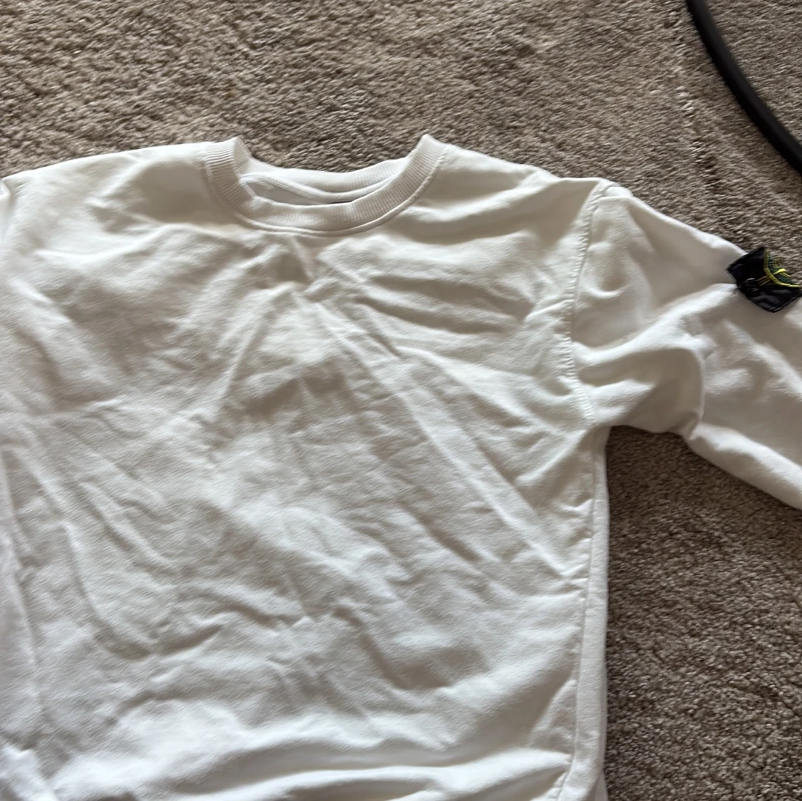 Vit långärmad tröja från Stone Island