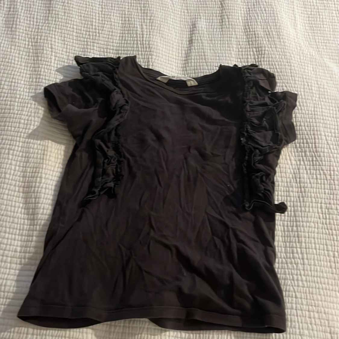 Svart volangblus från H&M