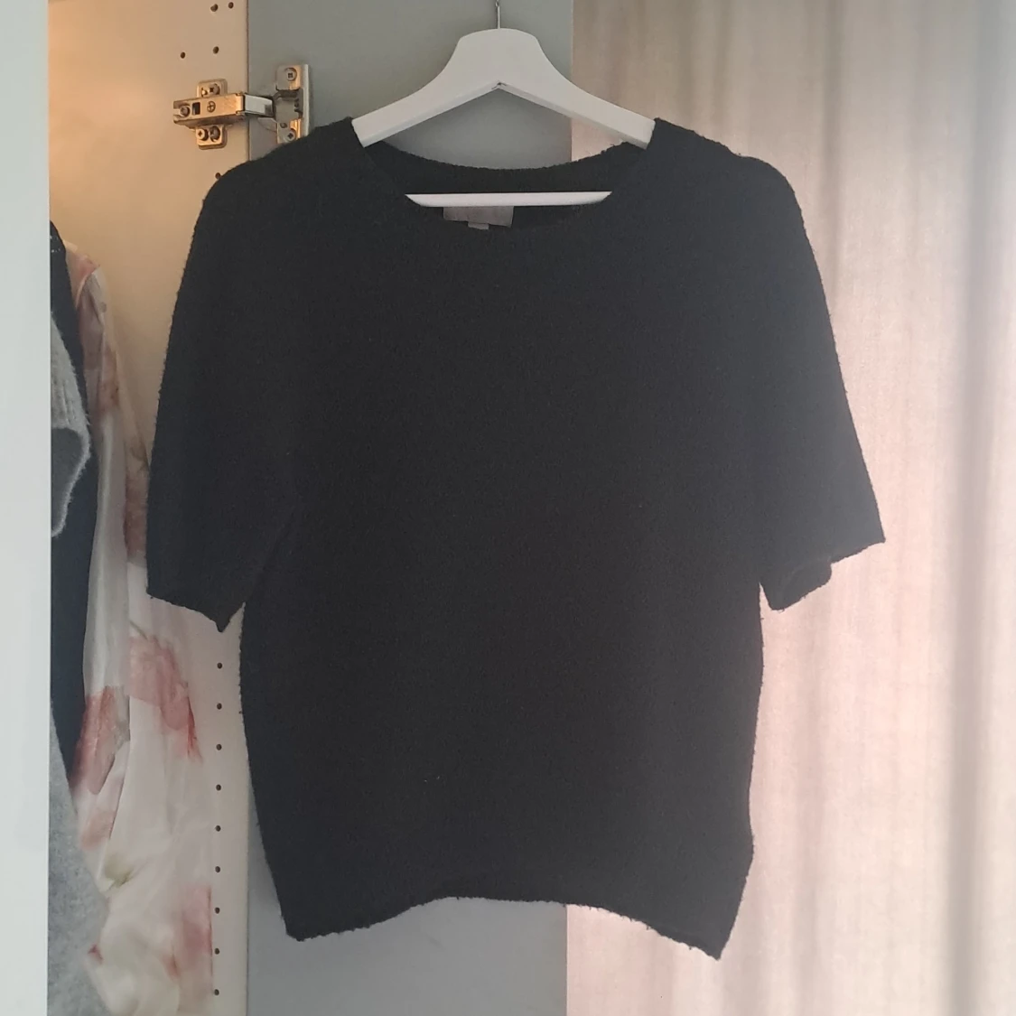 Svart stickad tröja från H&M