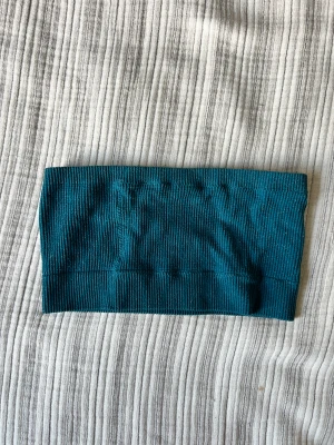 Bandeau topp glittrig  - Passsr XS/S  Aldrig använd