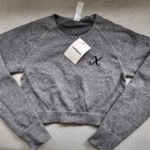 Ny xshapes topp  - Prislappar kvar, storlek small! Har även matchande sport bh till försäljning 🥰