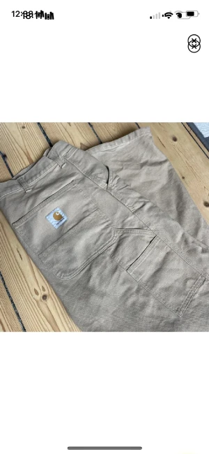 Carhartt pants - Carhartt byxor i rak modell i storlek W31 L32, unisex. Fint skick
