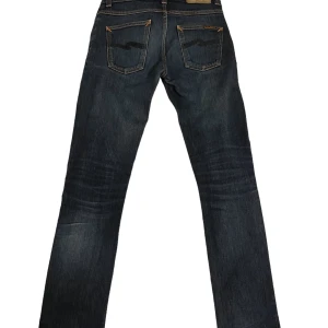 Nudie Jeans Grim Tim - Feta Nudie jeans, modellen är Grim Tim, W28 L32, Nypris 1500.  