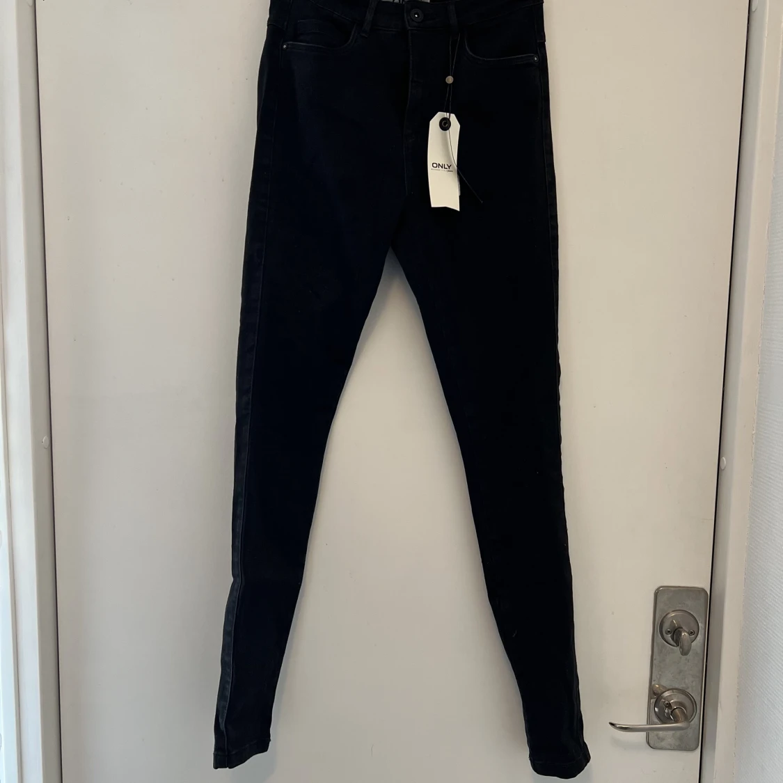 Oanvända Jeans