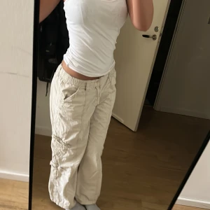 White cargos y2k - White cargos been worn 3 times almost new. From urban outfitters and cost 899 but selling for  280🥰