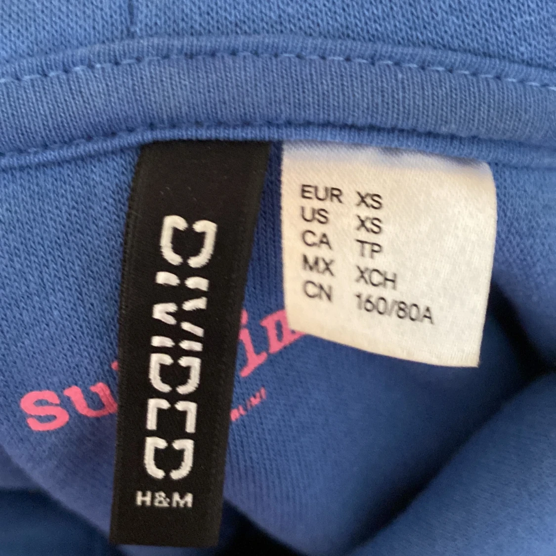 En ljusblå kofta - 91