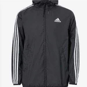 Vindjacka - Adidas vindjacka i herr modell. Sparsamt använd och är i mycket bra skick. Nypris 749kr. Kan sänka pris vid snabb affär. 