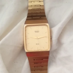 Seiko klocka - En fin guldig Seiko klocka som är i riktigt bra skick.