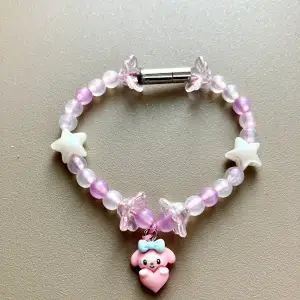 My melody armband med ett rostfritt spänne!  Stolek kan anpassas efter förfrågan! 