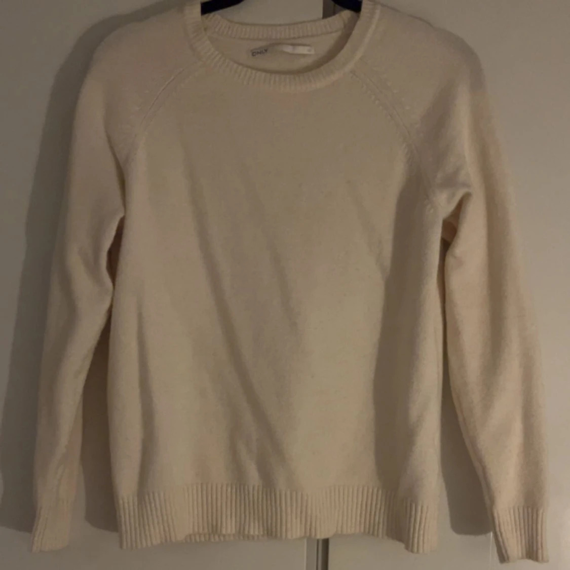 Beige stickad tröja