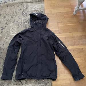 Vintage helly hansen jacka lite problem med zippen mörk grå