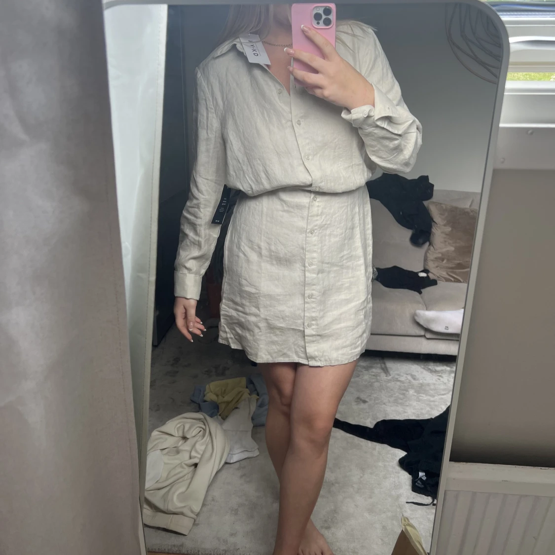 Oanvänd linneklänning