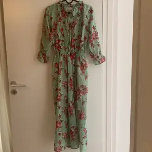 This is a new and unused floral dress,Perfect for summers. Mixed Cotton material with sleeves.I would like to sell this dress as It’s small for me.