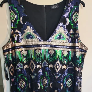 Kappahl klänning - Oanved klänning från Kappahl med paljetter strl XL 