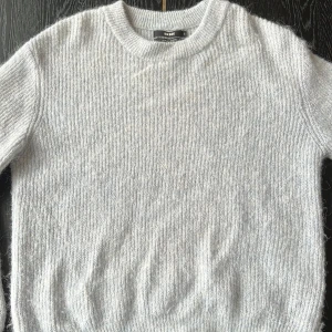 Stickad tröja - Fin ljusblå stickad tröja från bikbok, fint skick, använd ett flertal gånger❤️