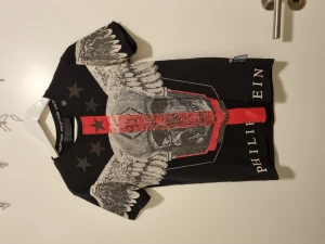 Philipp plein t-shirt - Kopia. Fint skick. Med strass.