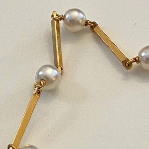 Armband guldpläterat  - Vackert armband med pärlor  Stämplat american doubble 