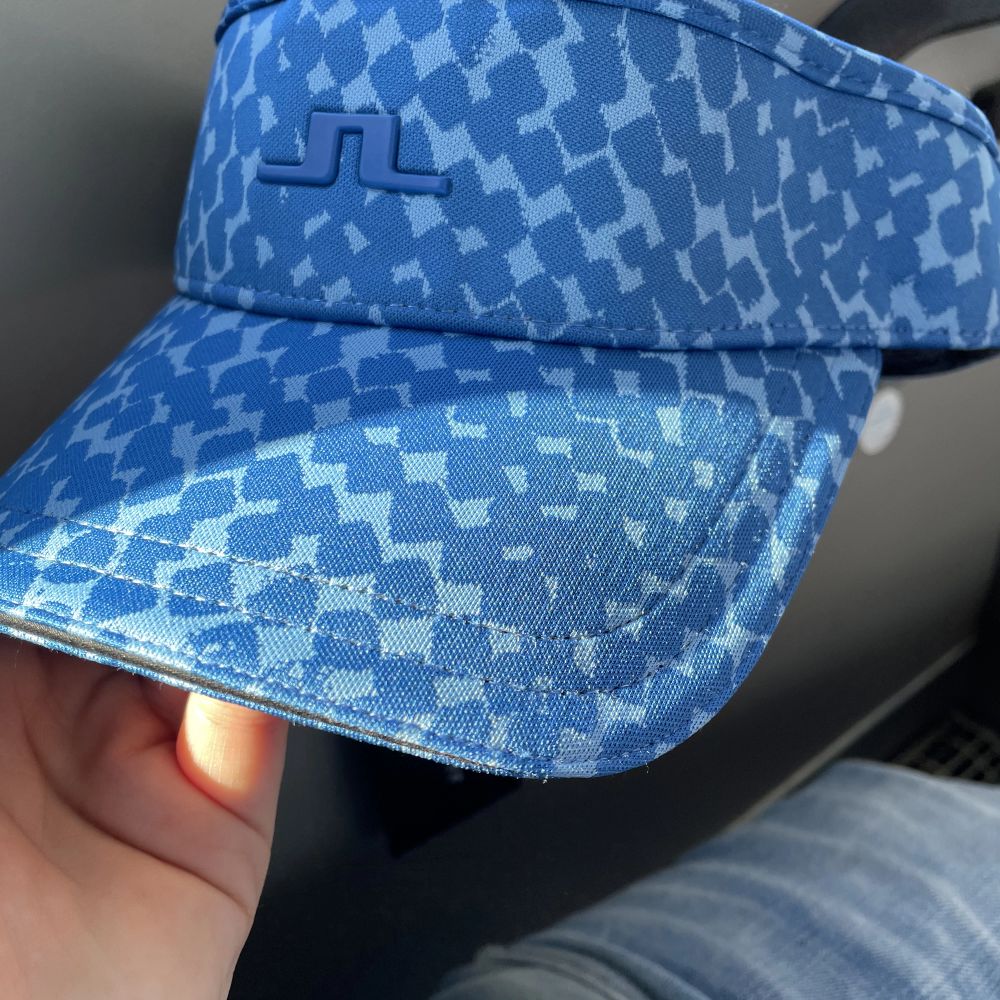 Blå Osläppt j lindberg golfkeps Plick Second Hand